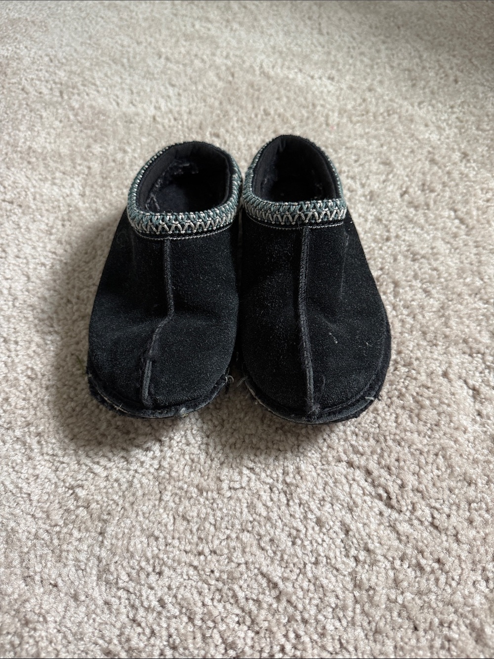 UGG Black Kids Slip-On Moccasin Slippers with Decorative Trim
